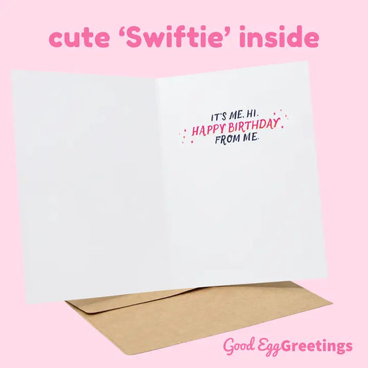 Good Egg Greetings Greeting card with 'Happy Birthday' text on a white page on a pink background, featuring 'Good Egg Greetings'.